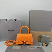 BALENCIAGA HOURGLASS SMALL TOP HANDLE BAG IN ORANGE - 1