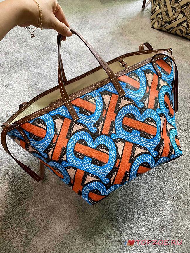 BURBERRY MINI MONOGRAN PRINT E-CANVAS BEACH TOTE BLUE & ORANGE - 1